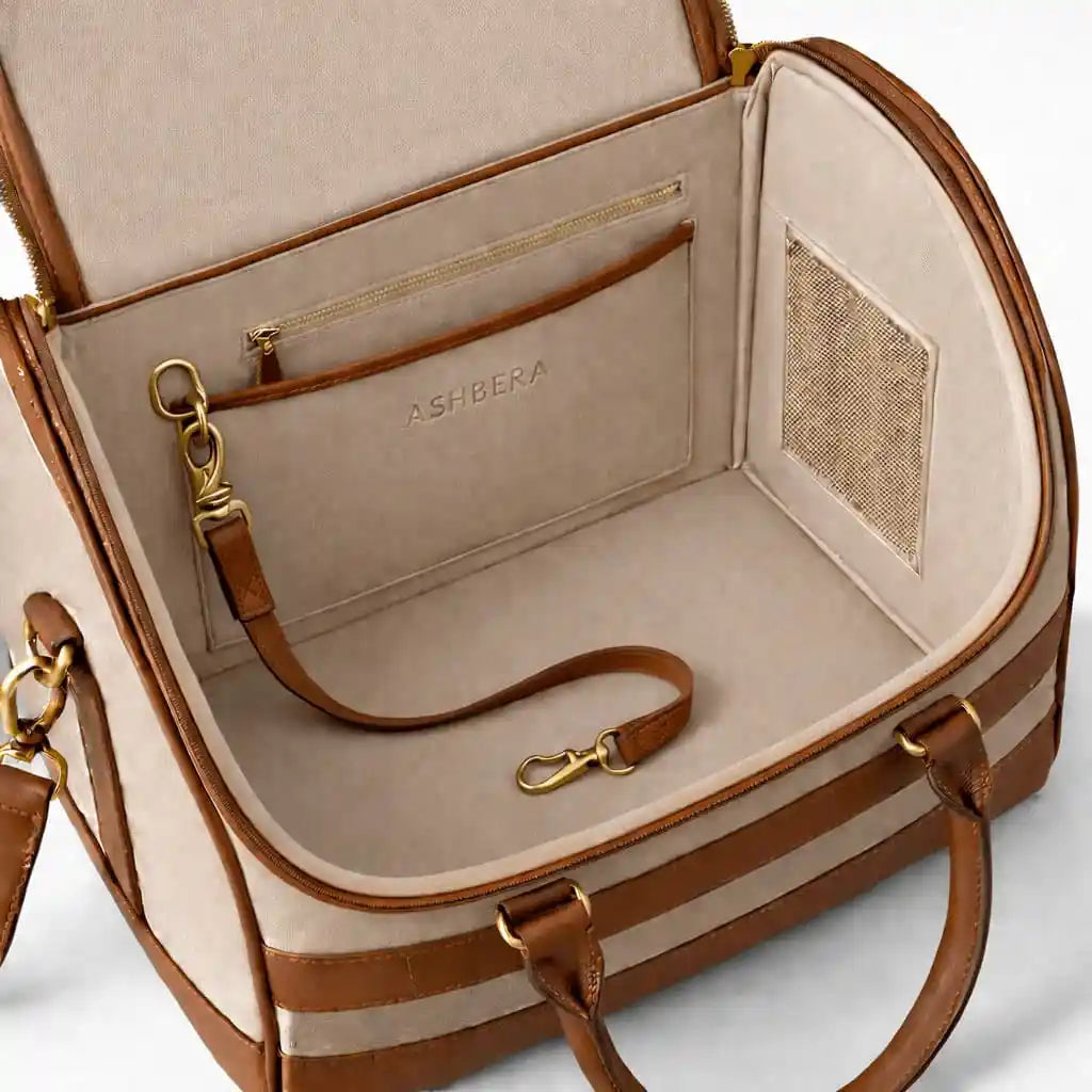 Ashbera structured dog carrier — cream interior lining with gold hardware, hand-assembled at Baikal atelier in Manhattan